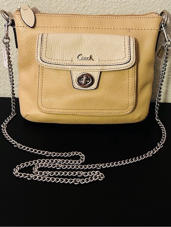 Coach Handbags - Coach cream & chalk Pebbled Leather Crossbody with new with tags chain strap
